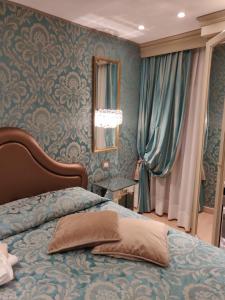 A bed or beds in a room at Ca' Marinella