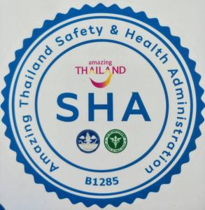 a sign for the american safety and hospital shha logo at Arawan Krabi Beach Resort in Ao Nam Mao