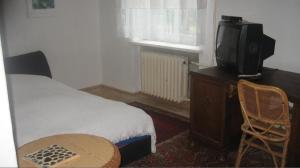 Ein Bett oder Betten in einem Zimmer der Unterkunft Unterkunft Ebertallee