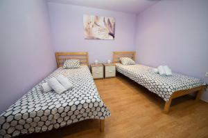 Posteľ alebo postele v izbe v ubytovaní Apartments Karina by El-Pi Tours + 26 fotografií