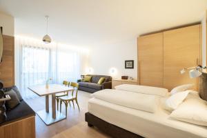 Postel nebo postele na pokoji v ubytování Hotel Gartenresidence Zea Curtis