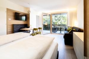 Postel nebo postele na pokoji v ubytování Hotel Gartenresidence Zea Curtis