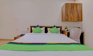 Postel nebo postele na pokoji v ubytování Sai Samrat Resort