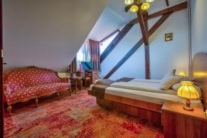 Un pat sau paturi într-o cameră la Residence Ambient