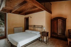 Postel nebo postele na pokoji v ubytování Vallicciola Nature Hotel