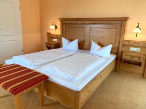 Postel nebo postele na pokoji v ubytování Hotel Sonnenblick