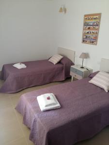 A bed or beds in a room at Vivienda vacacional La Graja