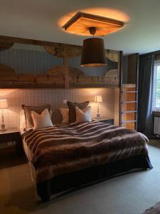 Postel nebo postele na pokoji v ubytování Chalet Bull Zermatt