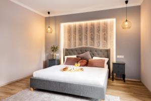 Postel nebo postele na pokoji v ubytování Wine & Wellness hotel Besední dům + 37 fotografií