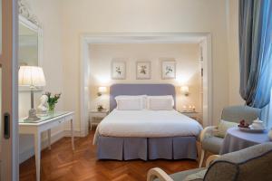 Posteľ alebo postele v izbe v ubytovaní Serristori Palace Residence