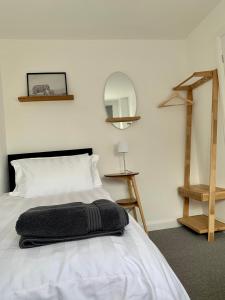 Postelja oz. postelje v sobi nastanitve Amaya Three - Newly Renovated - Sleeps 6 - Grantham