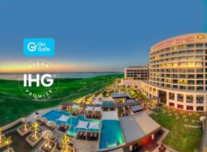 a large city with a lot of buildings at Crowne Plaza Yas Island, an IHG Hotel in Abu Dhabi
