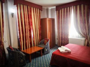 Et opholdsområde på Hotel Cavour Resort
