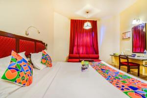 Cama o camas de una habitación en Hotel Ashish Plaza