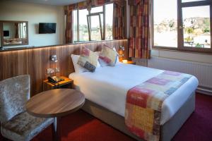 Letto o letti in una camera di West County Hotel