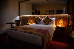 Letto o letti in una camera di West County Hotel