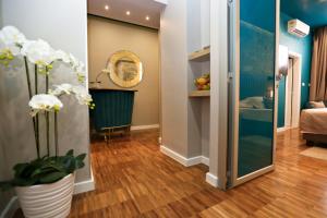Posteľ alebo postele v izbe v ubytovaní Riva Luxury Rooms