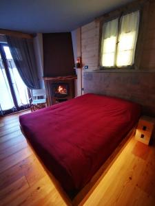 Posteľ alebo postele v izbe v ubytovaní B&B Ronco Carbon