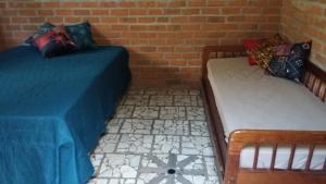 Postel nebo postele na pokoji v ubytování Beco das Garrafas