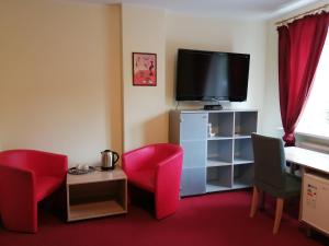 TV a/nebo společenská místnost v ubytování Idilė Bed & Breakfast - Visaginas