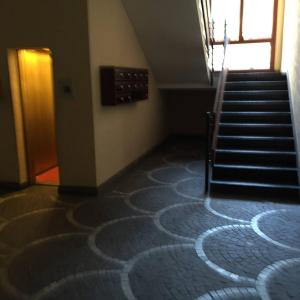 a room with a spiral carpet on the floor at La Cupola Suite in Rome