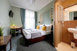 Posteľ alebo postele v izbe v ubytovaní Amber Boutique Hotels - Hotel Amber
