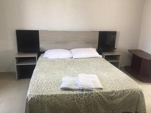 Postel nebo postele na pokoji v ubytování POUSADA ALEFER