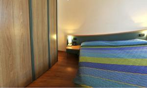 Postel nebo postele na pokoji v ubytování Hotel Vela
