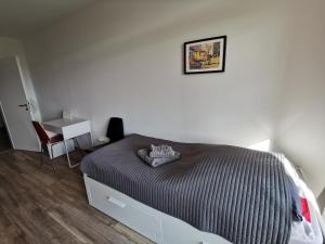 1-Zimmer Appartement in Hannover/Bemerodeにあるベッド