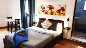 Cama ou camas em um quarto em Guesthouse of Alcobaça