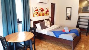 Cama ou camas em um quarto em Guesthouse of Alcobaça