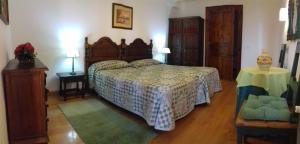 A bed or beds in a room at Apartamentos El Majuelo