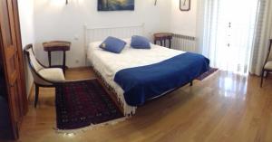 A bed or beds in a room at Apartamentos El Majuelo