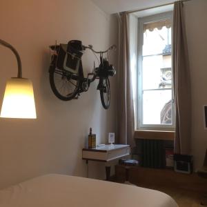 Postel nebo postele na pokoji v ubytování Hôtel Le Boulevardier