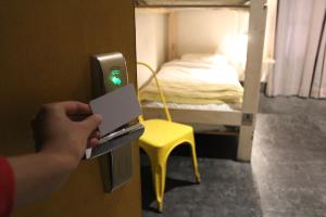 Cama ou camas em um quarto em Hostel Boutique Merced 88