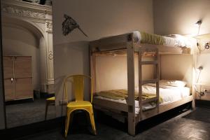 Cama ou camas em um quarto em Hostel Boutique Merced 88