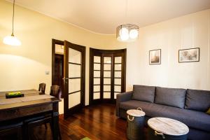Posedenie v ubytovaní Plac Zbawiciela Elegant Apartment