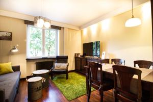 Posedenie v ubytovaní Plac Zbawiciela Elegant Apartment