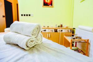 Voodi või voodid majutusasutuse Hotel Gong toas