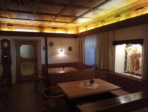 Posezení v ubytování Cafe Pension Erbhof