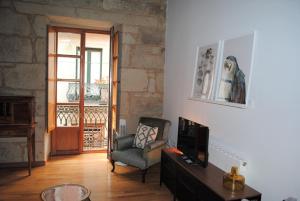 Posedenie v ubytovaní Exclusivo apartamento en edificio histórico