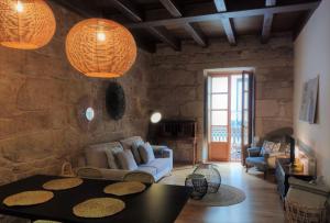 Posedenie v ubytovaní Exclusivo apartamento en edificio histórico