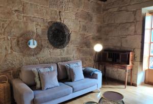 Posezení v ubytování Exclusivo apartamento en edificio histórico