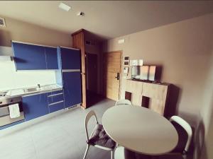 Kuchyňa alebo kuchynka v ubytovaní Dannunziano Aparthotel