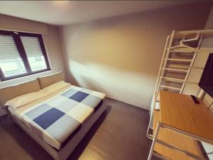 Posteľ alebo postele v izbe v ubytovaní Dannunziano Aparthotel