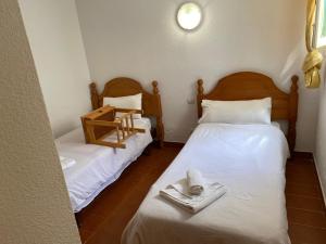 Postel nebo postele na pokoji v ubytování Casa de 5 dormitorios y 2 terrazas + 29 fotografií