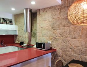 Fotografia z galérie ubytovania Exclusivo apartamento en edificio histórico v destinácii Pontevedra
