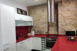 Kuchyňa alebo kuchynka v ubytovaní Exclusivo apartamento en edificio histórico