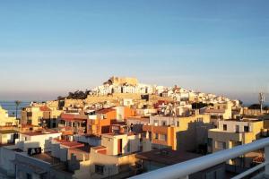 a group of buildings on top of a hill at Piso 3 habitaciones en Pescadores, 6 in Peniscola