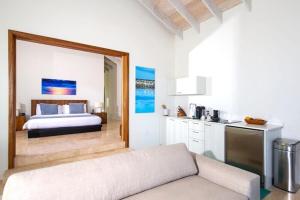 Postel nebo postele na pokoji v ubytování Sailrock South Caicos - Oceanview Villas & Suites
